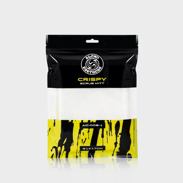 Profesjonalny packshot rękawicy Crispy 1 sztuka wraz z czarnym opakowaniem na jasnym tle.