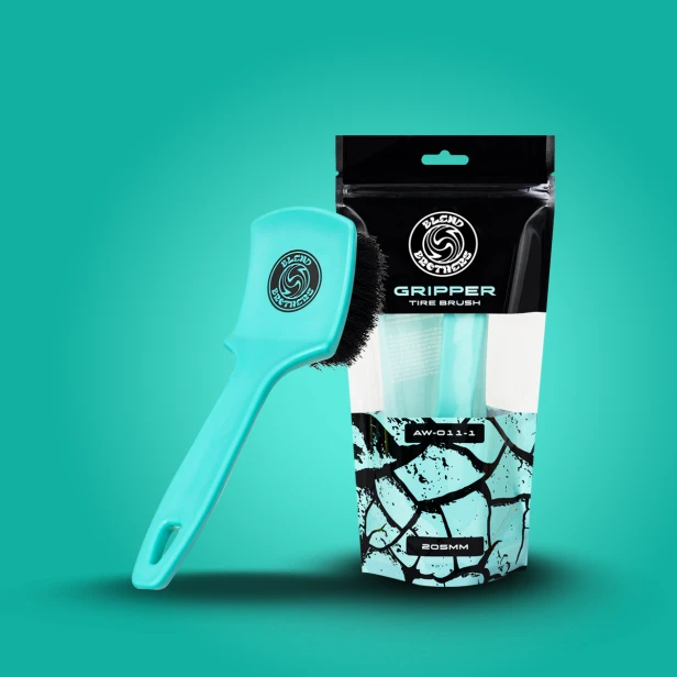 Front matowego opakowania szczotki Gripper z turkusowymi detalami graficznymi.