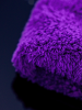 Pokazanie detalu szmatki Plushie z bliska. Zbliżenie na pluszową strukturę tkaniny.