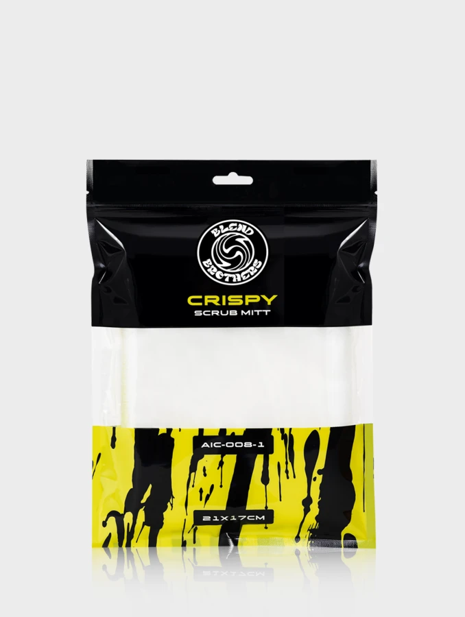Profesjonalny packshot rękawicy Crispy 1 sztuka wraz z czarnym opakowaniem na jasnym tle.