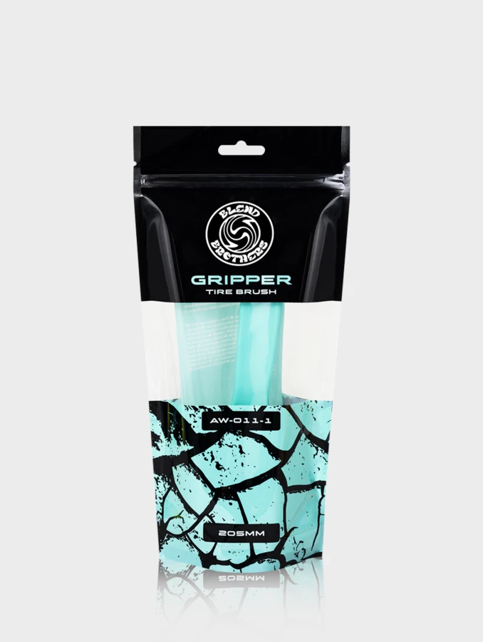 Profesjonalny packshot szczotki Gripper na jasnym tle z lustrzanym odbiciem.